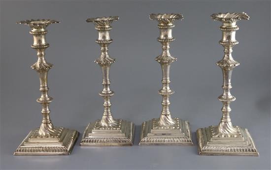 A set of four early George III silver candlesticks by William Cafe, 83.5 oz.